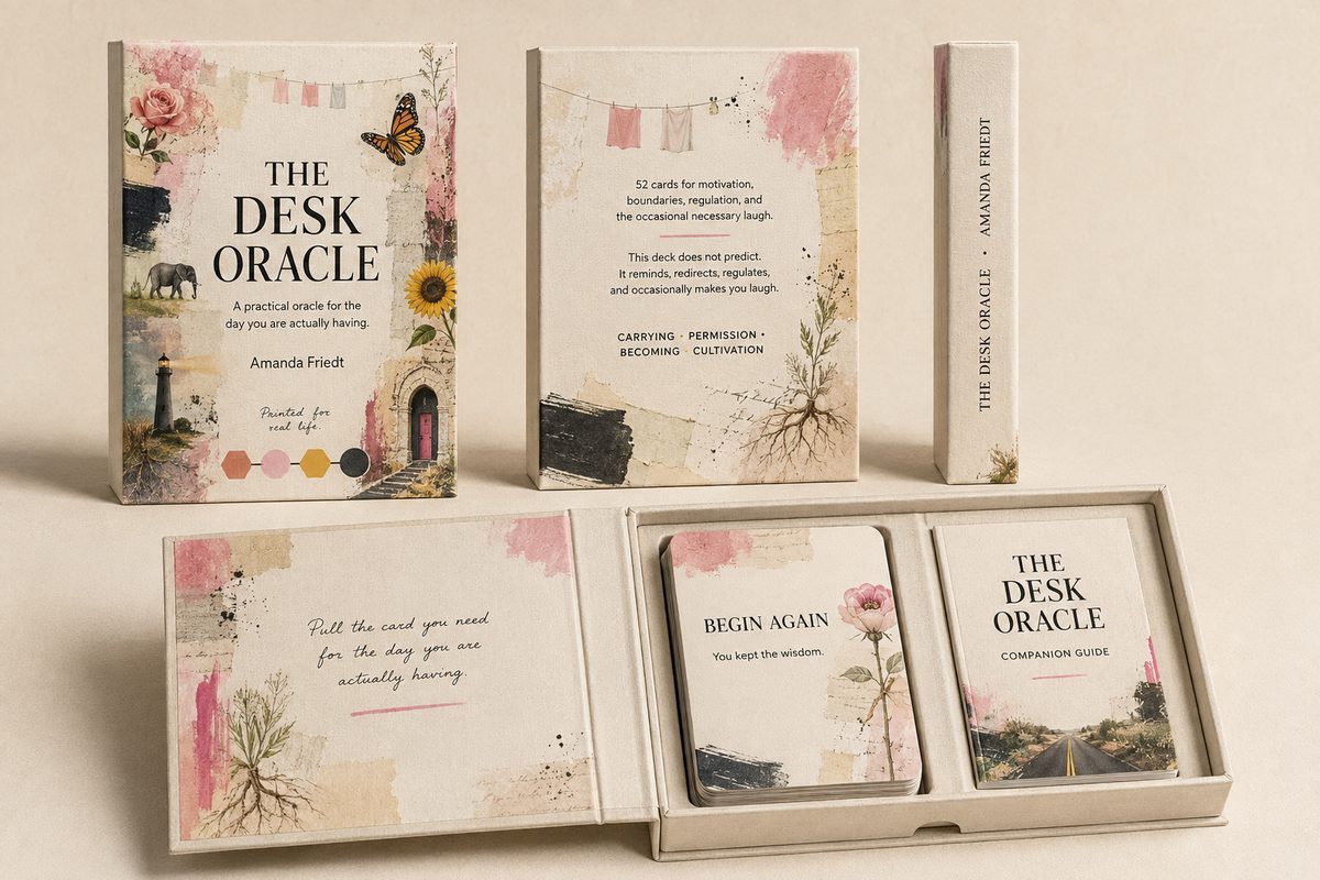 The Desk Oracle box, card stack and companion guide in cream collage packaging with roses, a lighthouse and an elephant