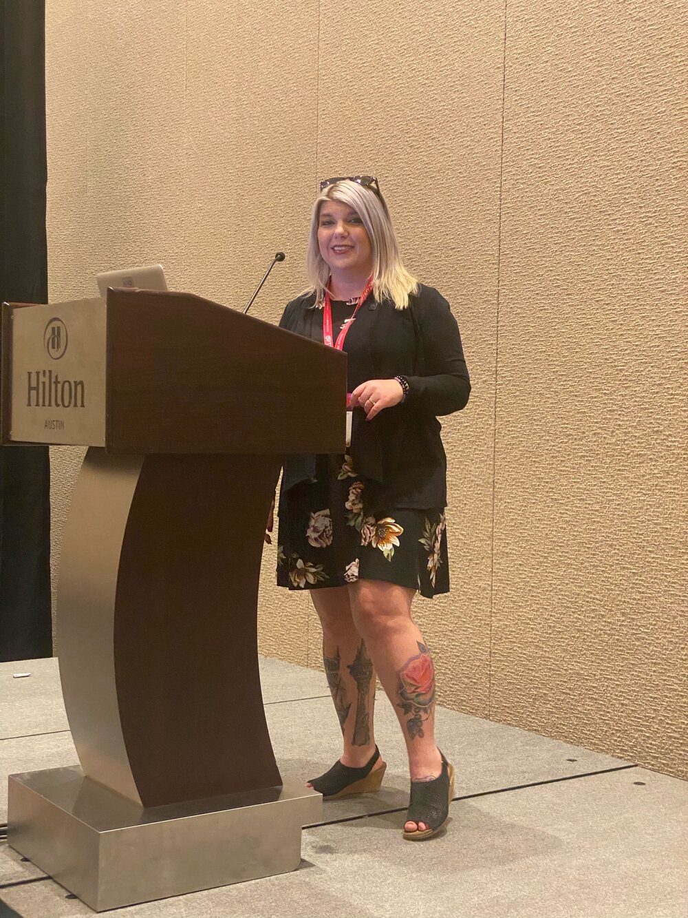 Amanda Friedt presenting from a podium