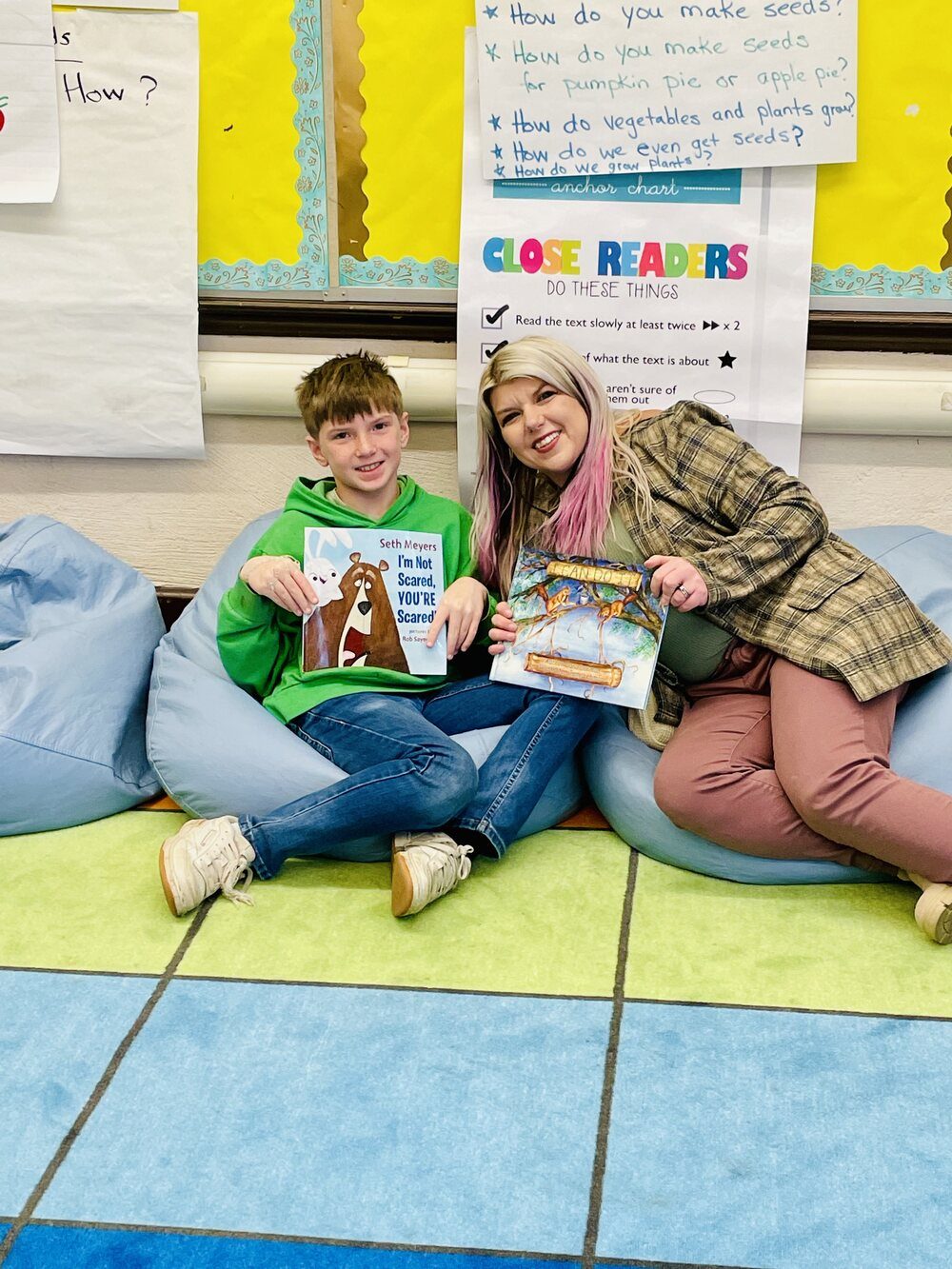 Amanda Friedt reading with a student at Bunche Preparatory Academy in Detroit